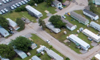 Cropped detail of mobile homes with intact roofs